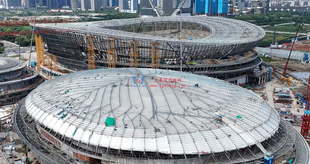 硬核施工提速!余杭國際體育中心足球場“鋼鐵骨架”成型,靜待天幕綻放 硬核施工提速!余杭國際體育中心足球場“鋼鐵骨架”成型,靜待天幕綻放